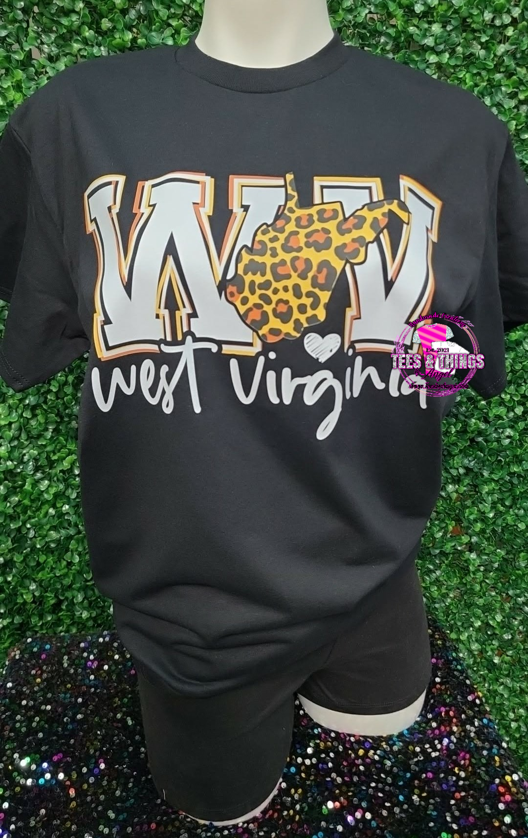 WV w/ leopard print silhouette.