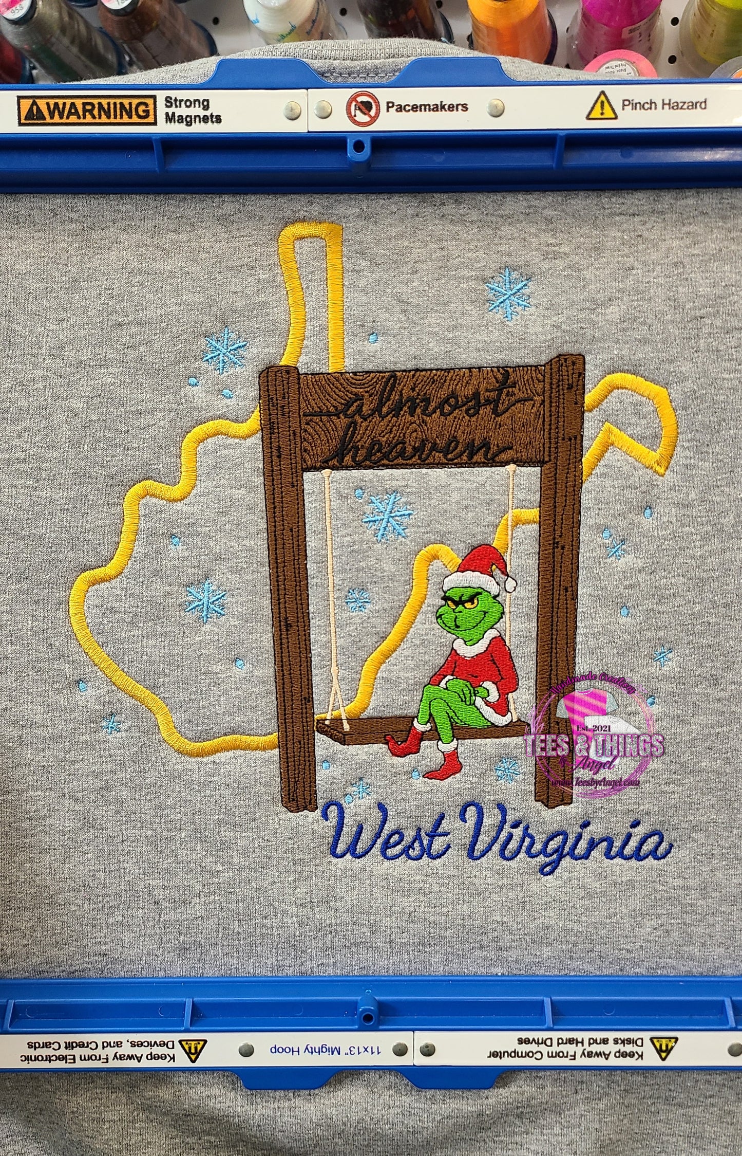 WV Almost Heaven Grinch on a Swing Embroidered sweatshirt! 💚 ❄️