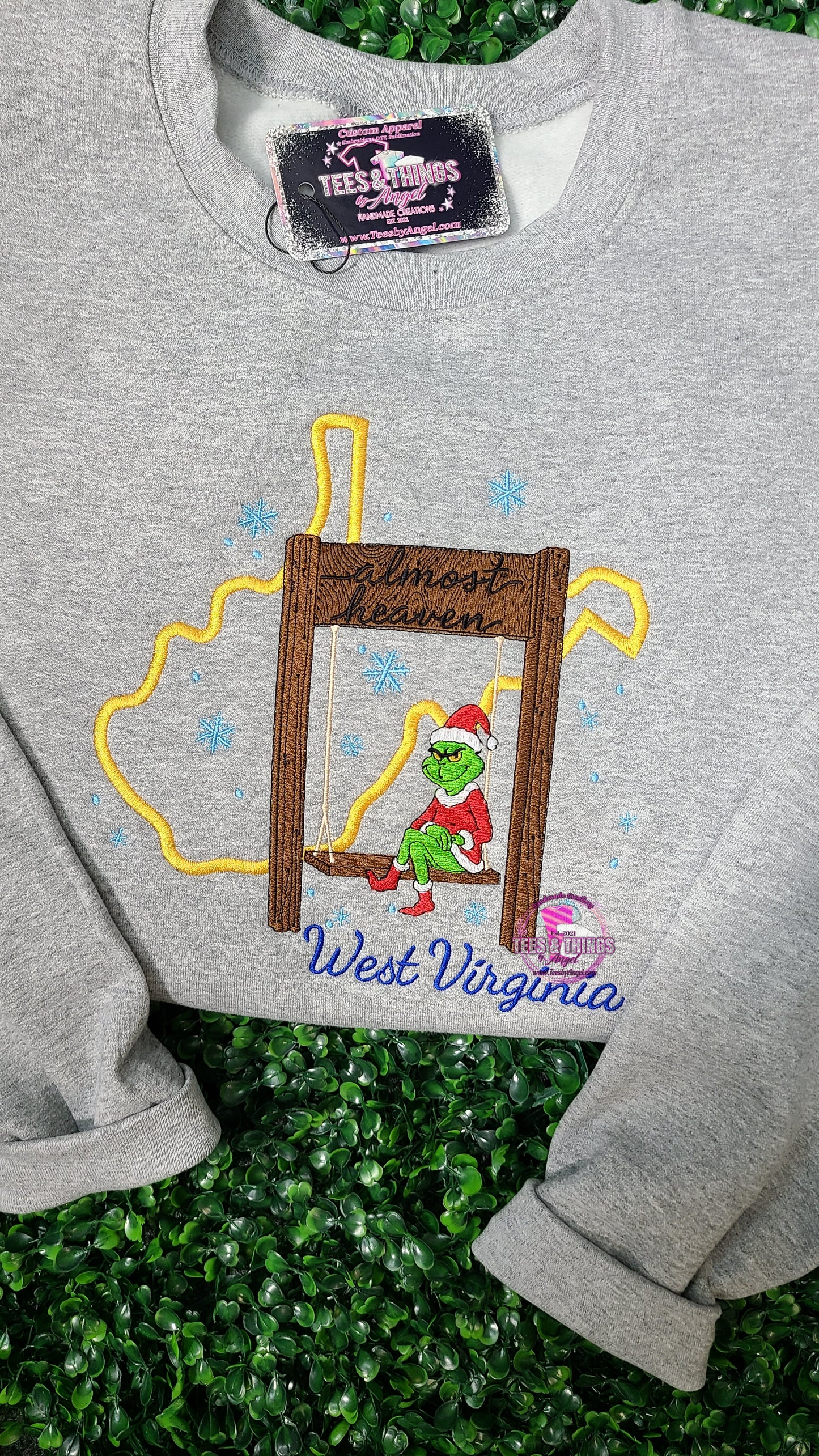 WV Almost Heaven Grinch on a Swing Embroidered sweatshirt! 💚 ❄️