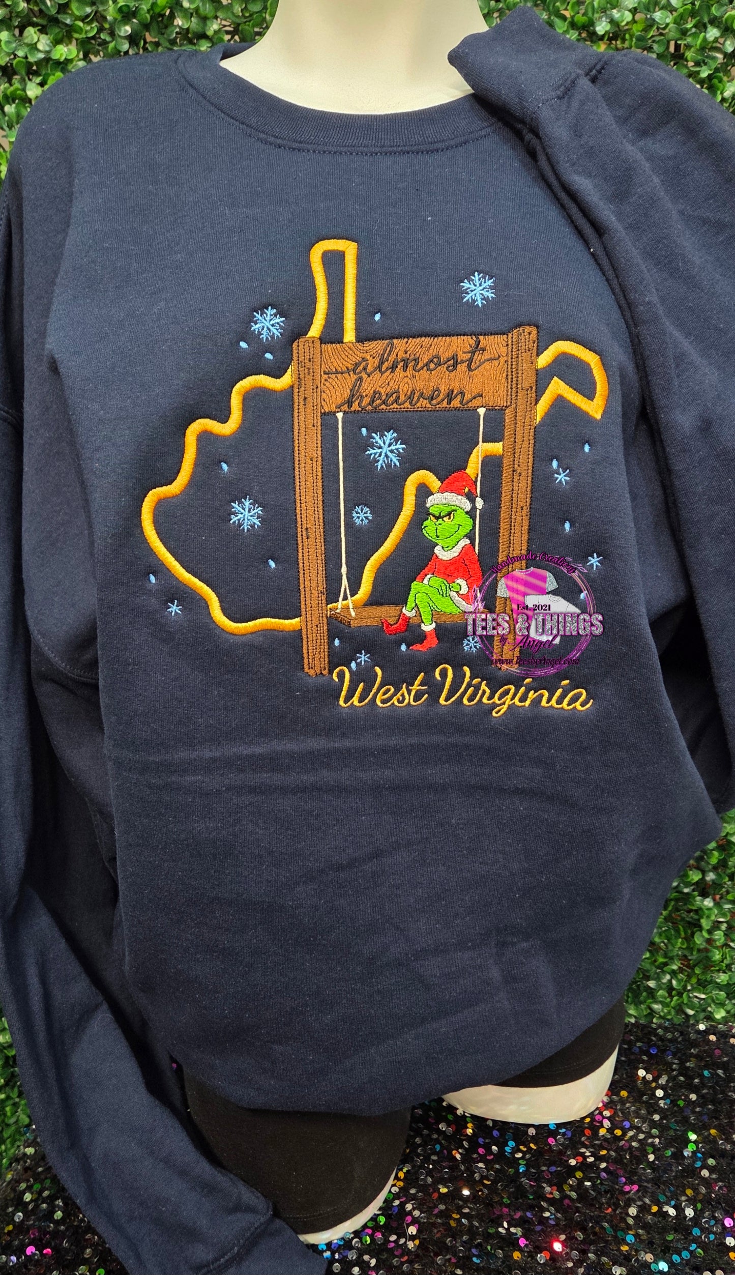 WV Almost Heaven Grinch on a Swing Embroidered sweatshirt! 💚 ❄️